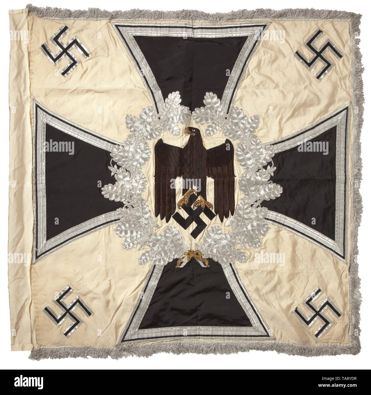 A troop flag of the infantry Made entirely of white silk with silver fringe on three sides. With a white disc on both sides, bordered by a silver-embroidered oak leaf wreath with central brown army eagle, in the background an Iron Cross of black silk, bordered in silver. The corners with black swastikas, bordered in silver. Colour-fresh, the pole-sleeve with traces of nails, barely noticeable stains. Dimensions circa 120 x 120 cm. In family possessions since the end of the war. historic, historical, infantry, military, armed forces, militaria, ob, Additional-Rights-Clearance-Info-Not-Available Stock Photo