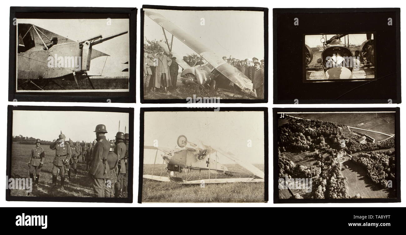 Circa 90 glass positives of a German field flying detachment, in a wooden box Measuring 12 x 9 cm, labelled according to an internal numbering system, paper frames. The pictures show many types of biplane and monoplane, crashed aircraft, technical details like cockpit and weapons, aviators in uniform and flying helmet in front of their planes, aerial photographs of towns, fortresses, positions and other planes in the air. Includes several broken positives. In a wooden box for safekeeping, with labelled numbering. The images not checked for completeness, matching numbers and, Editorial-Use-Only Stock Photo