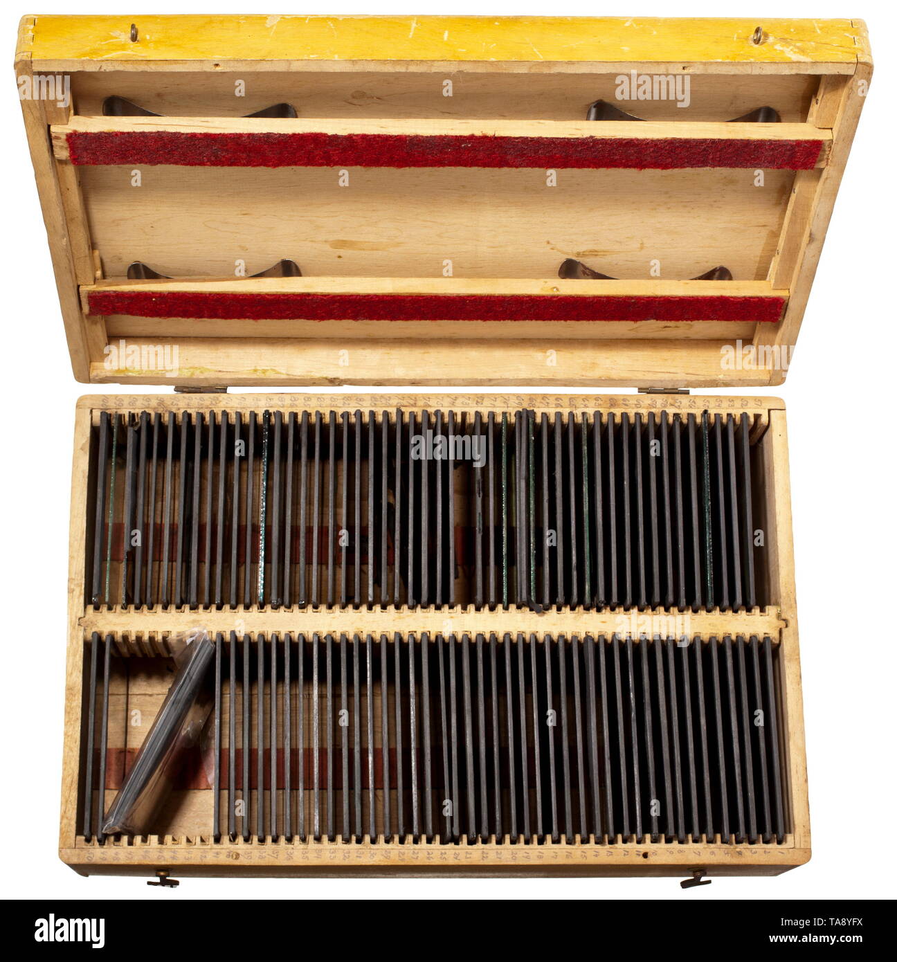 Circa 90 glass positives of a German field flying detachment, in a wooden box Measuring 12 x 9 cm, labelled according to an internal numbering system, paper frames. The pictures show many types of biplane and monoplane, crashed aircraft, technical details like cockpit and weapons, aviators in uniform and flying helmet in front of their planes, aerial photographs of towns, fortresses, positions and other planes in the air. Includes several broken positives. In a wooden box for safekeeping, with labelled numbering. The images not checked for completeness, matching numbers and, Editorial-Use-Only Stock Photo