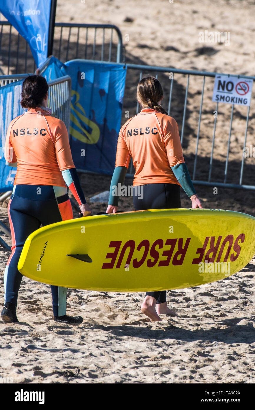 NSLSC members of a Surf Rescue training session on Fistral Beach in Newquay in Cornwall. Stock Photo