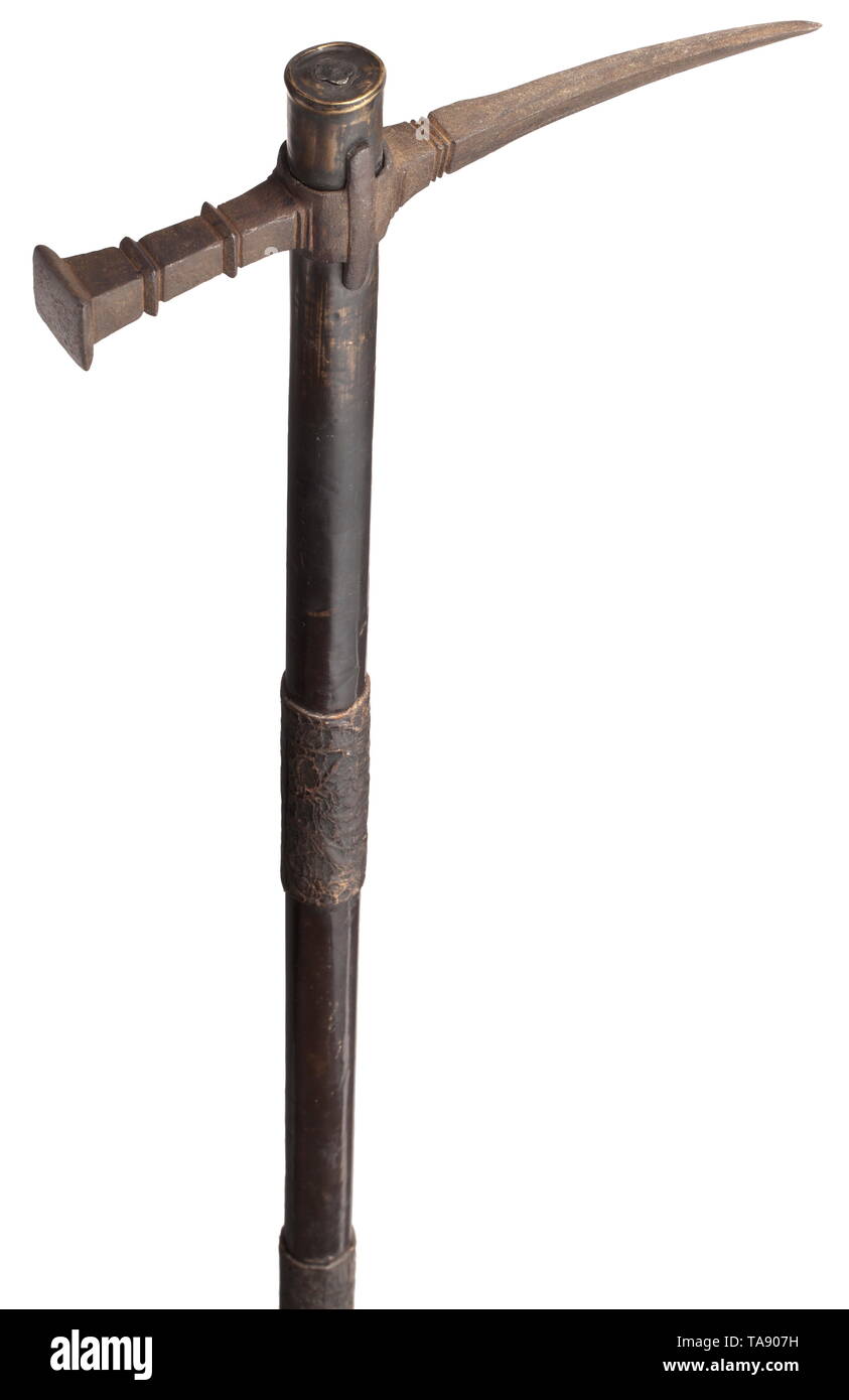 A Hungarian/Polish war hammer, 17th centur Long, curved, beak-like fluke with grooves on both sides and a tapering, quadrangular hammer head. Wooden haft, partly covered in leather, with brass fittings and iron strap loop at the end. Length 69 cm. historic, historical, tool, tools, military, militaria, fighting device, object, objects, stills, clipping, cut out, cut-out, cut-outs, metal, metals, weapon, arms, weapons, arms, utensil, piece of equipment, utensils, Zubeh 17th century, Additional-Rights-Clearance-Info-Not-Available Stock Photo