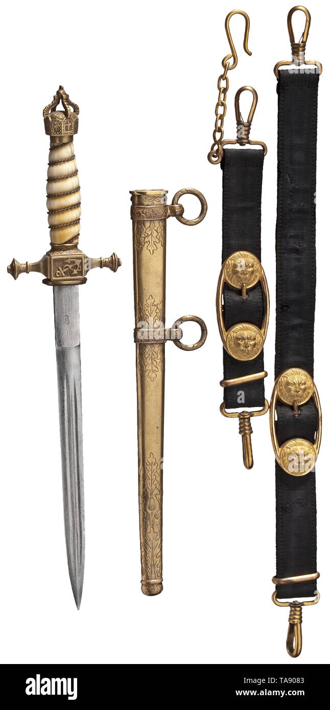 A dagger for officers of the imperial navy with Damascus blade and hangers Blade of wild Damascus with double fullers on both sides, the root stamped with the knight's head mark of the company WKC, Solingen. Non-ferrous metal hilt (remnants of gilding), the pommel shaped like an openworked imperial crown, scabbard locking, ivory grip with wire winding. Gilt non-ferrous metal scabbard with contemporary engraved initial 'L' beneath a noble's coronet. Hangers of black ribbed silk, lined with velvet (slightly damaged), gilt slide and snap hook. Signs, Additional-Rights-Clearance-Info-Not-Available Stock Photo