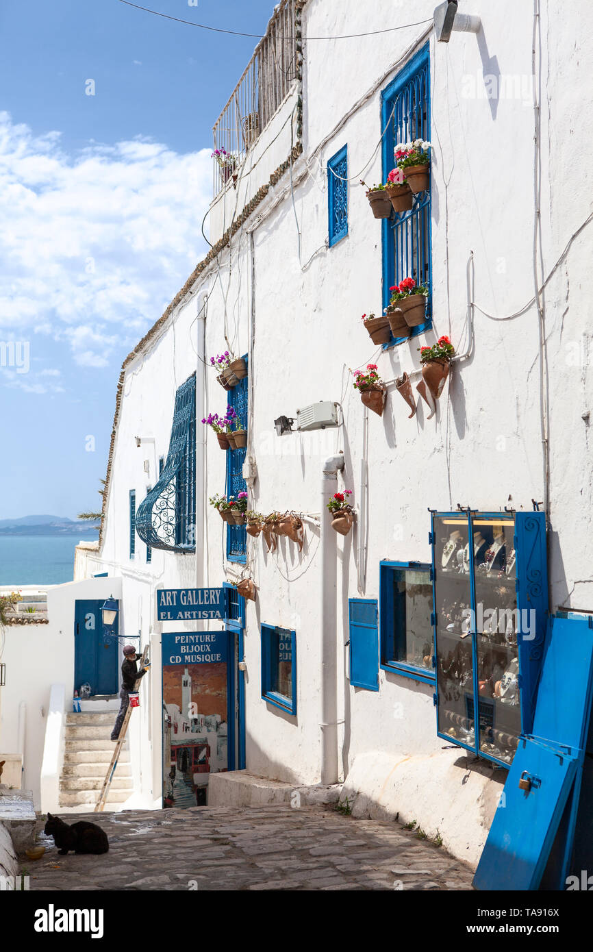 SIDI BOU SAID, TUNISIA, AFRICA-CIRCA MAY, 2012: Beautiful facades of houses  are in central part of Sidi Bou Said. Town itself is tourist attraction an  Stock Photo - Alamy