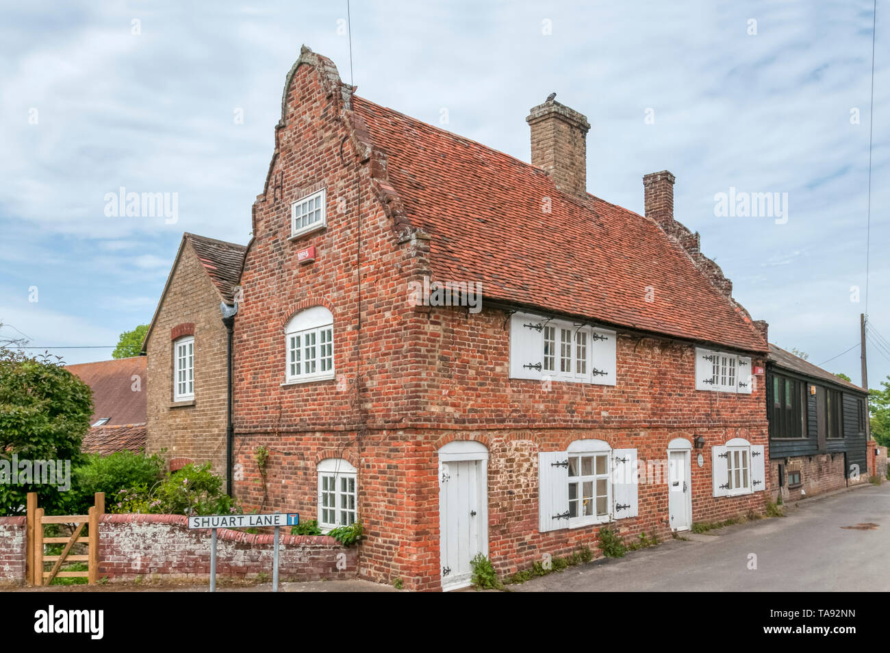 Late 17th century house with a shaped-gable end in St Nicholas-at-Wade, Kent. Stock Photo