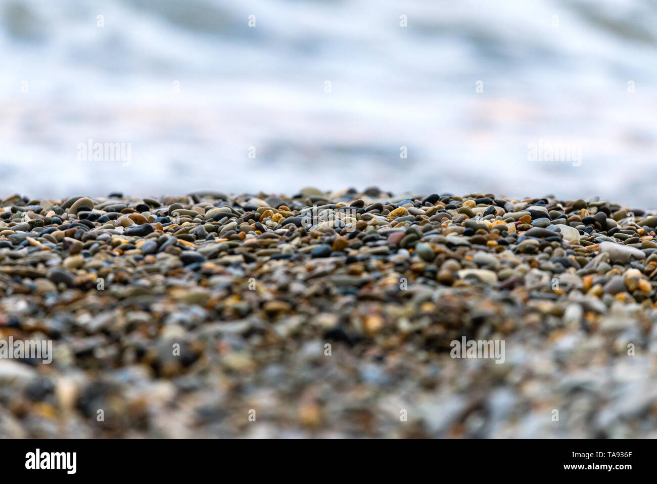 Small blue-gray stone background, natural stone pattern.selective focus. Stock Photo
