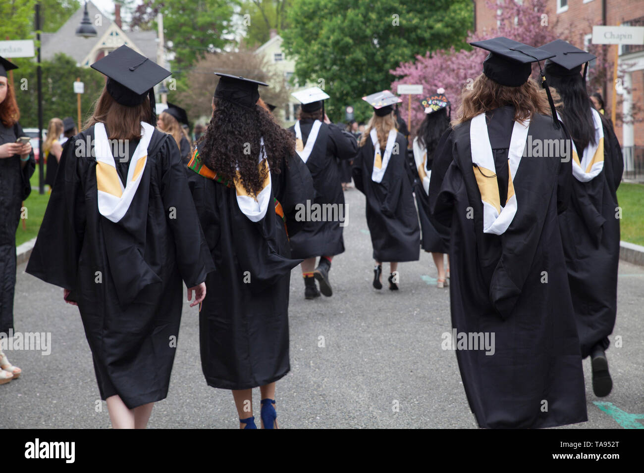 Women in graduation regalia hires stock photography and images Alamy
