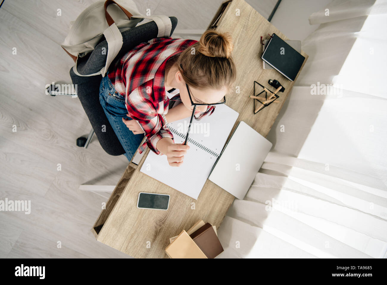 Teenager girl homework table hi-res stock photography and images - Alamy