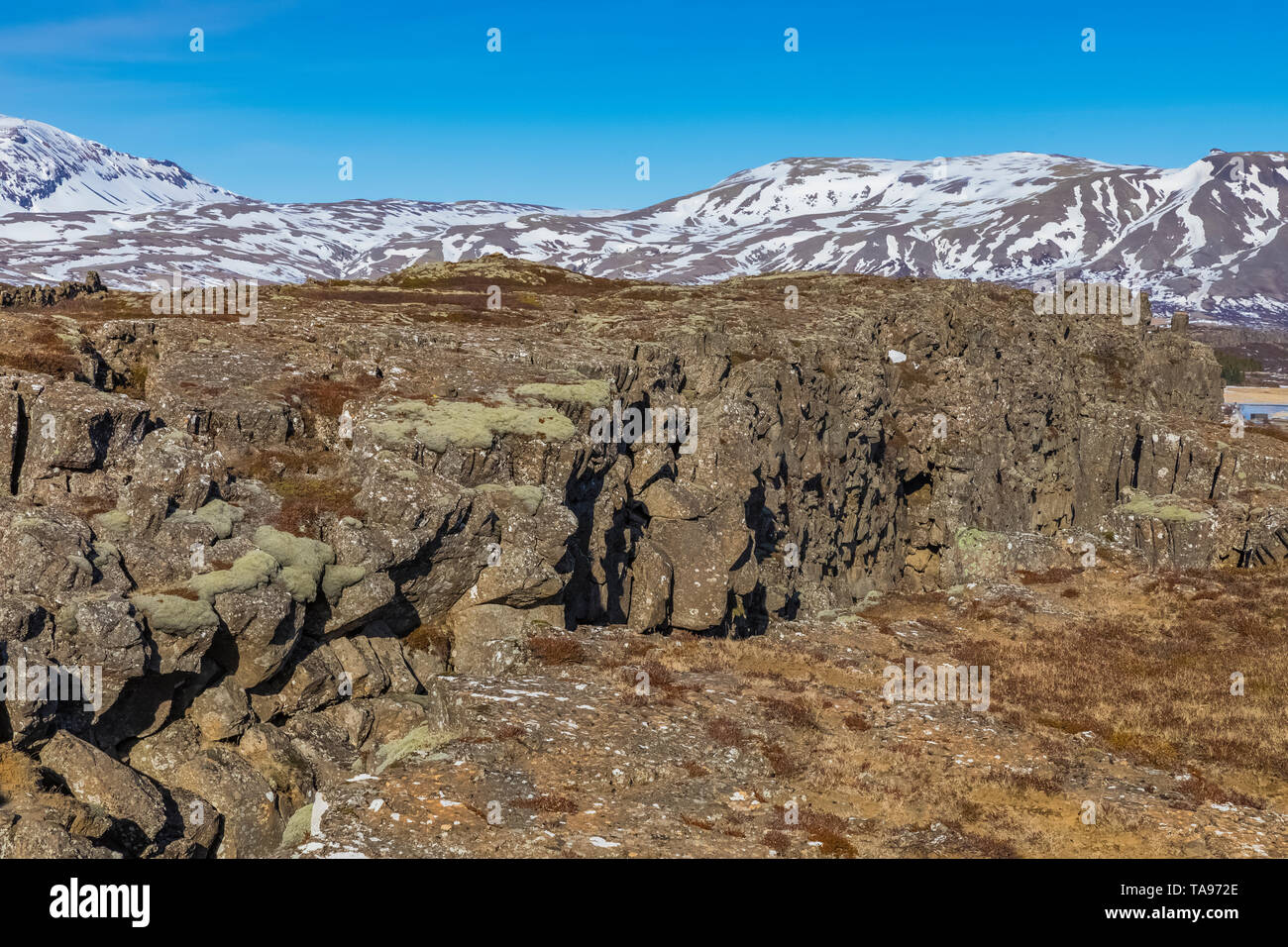 Almannagjá Gorge, a rift valley between the separating North American and Eurasian tectonic plates, in Þingvellir National Park, Iceland Stock Photo