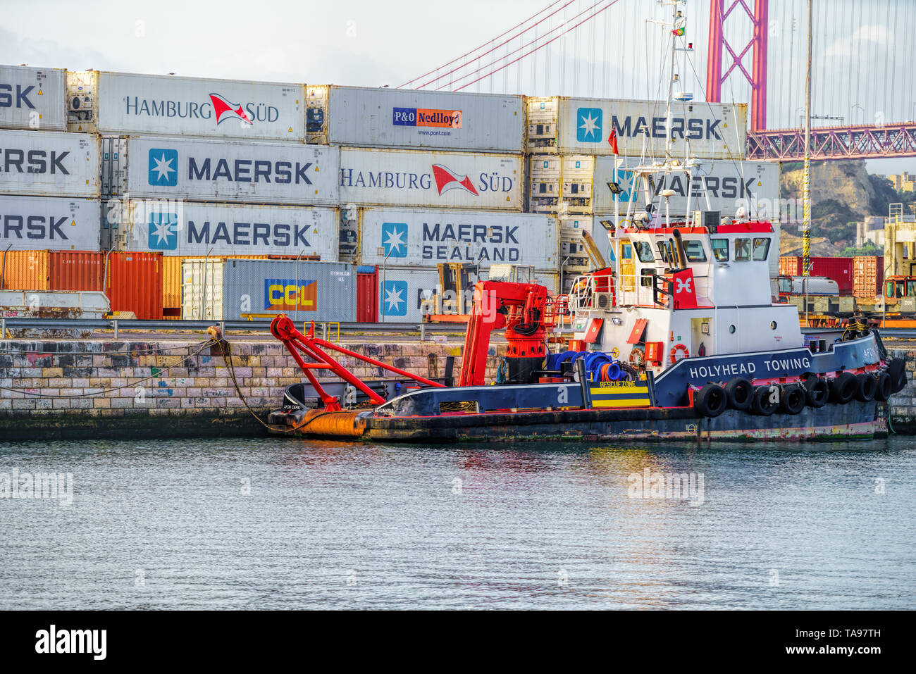 Port of Lisbon on the banks of the Tagus River with a backdrop of ...