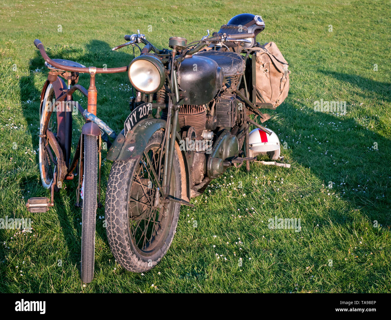 Barn find Motorcycle and bicycle Stock Photo