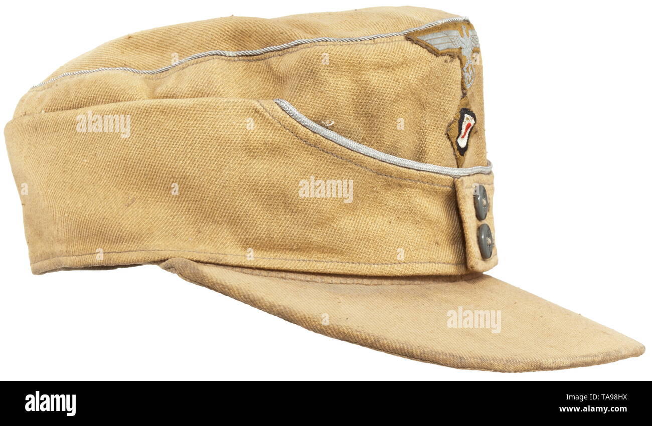 A tropical field cap for army officers Sand-coloured looted cloth with encircling officer's braid, grey glass buttons, BeVo-woven insignia (version for enlisted men), green linen herringbone lining. historic, historical, 20th century, Additional-Rights-Clearance-Info-Not-Available Stock Photo