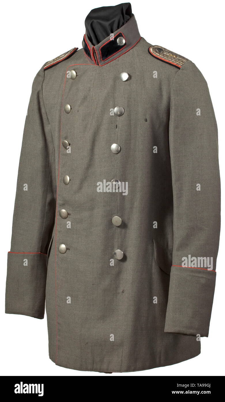 A litewka (uniform tunic) for an officer in the Pioneer Battalion von Rauch (1st Brandenburg) no. 3 Tunic of field-grey cloth, red piping, with two rows of silver buttons. Sewn shoulder boards and collar patches with red piping and red/black lining, silver braiding with applied '3', black interweaves. Grey silk lining, the left sleeve stamped on the inside 'Stepanek, Chemnitz' and '3K'. Two slanted coat-tail pockets, loops for orders clasp. Slight signs of age and wear. historic, historical, 20th century, 1910s, First World War / WWI, world war, , Additional-Rights-Clearance-Info-Not-Available Stock Photo