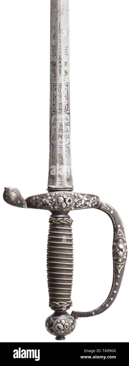 A German Silver Inlaid Pillow Sword Circa 1640 Double Edged Blade Of Hexagonal Cross Section The Base Decorated With Etchings On Both Sides Iron Knuckle Bow Hilt On One Side Guard Ring With Elaborate Floral