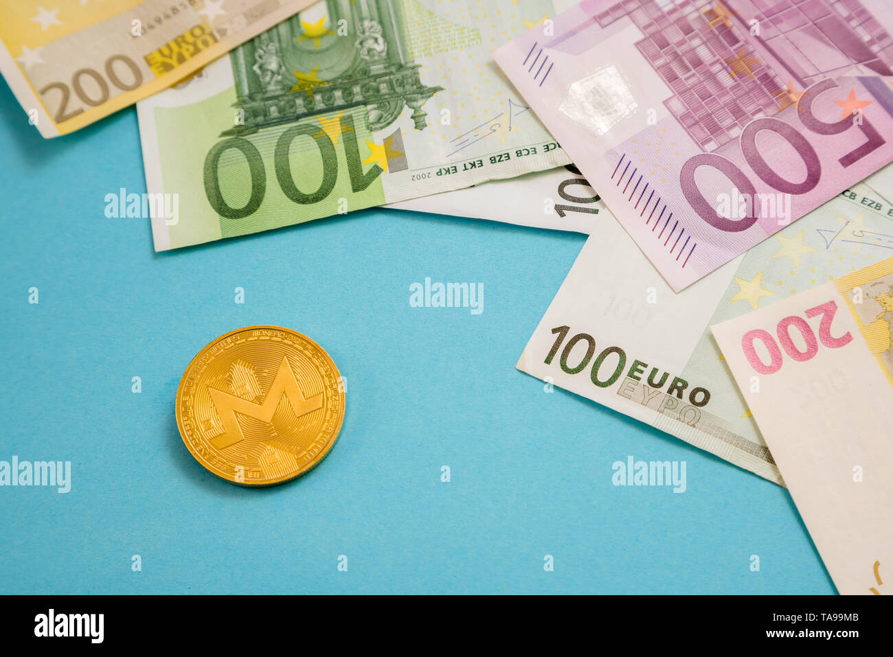 Monero Crypto Currency Symbol on Mirror Covered In Smoke With many  Reflections of Itself Stock Photo - Alamy