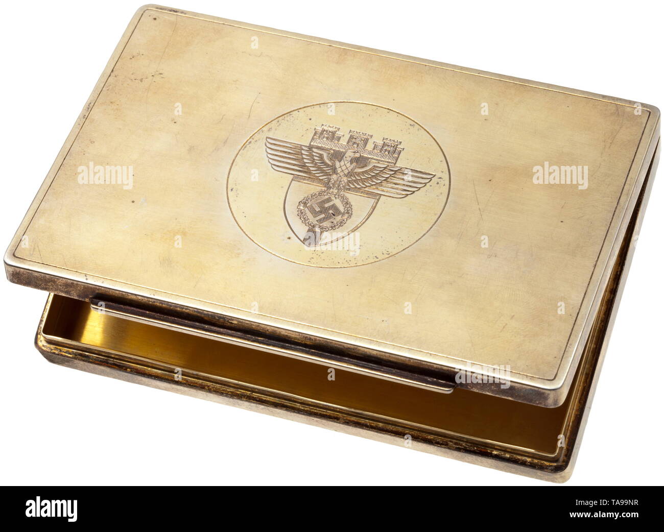 Erich Koch (1896 - 1986), Gauleiter of the NSDAP in East Prussia - a silver cigarette case presented to Gauleiter 'Oberdonau' August Eigruber Personal birthday present for Eigruber's 35th birthday on 16 April 1942. Gold-plated silver cigarette case (.925). The lid with engraved coat of arms of the 'Gau Ostpreußen' with national eagle. The inside of the lid engraved with facsimile signature 'Erich Koch' and date '16.4.42'. The lateral rim punched with silver hallmark and jeweller's mark of master goldsmith Prof. Herbert Zeitner. Dimensions 7.5 x 11.5 x 1.5 cm, weight circa 2, Editorial-Use-Only Stock Photo