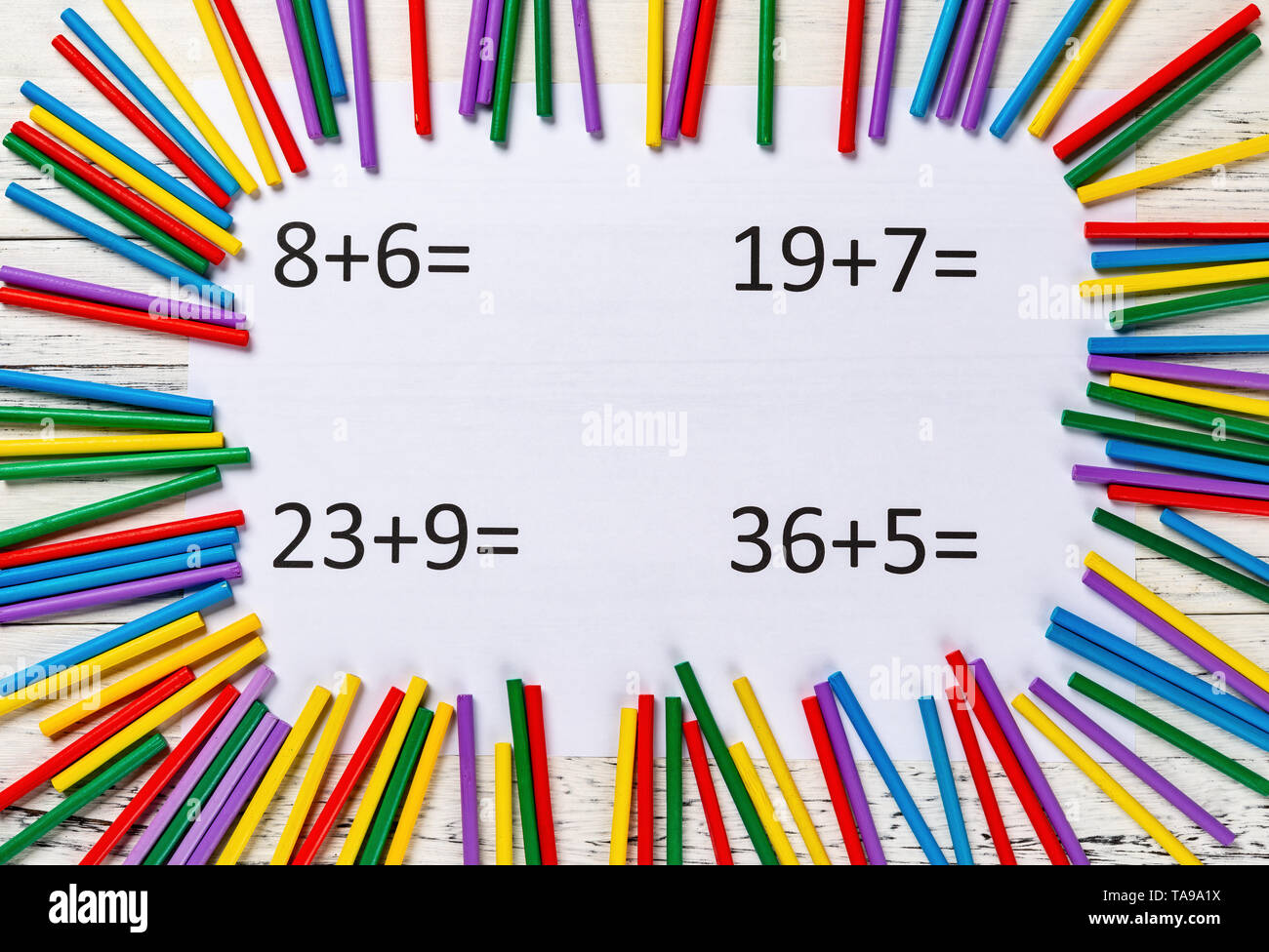 top view addition equations with colorful counting rods Stock Photo - Alamy