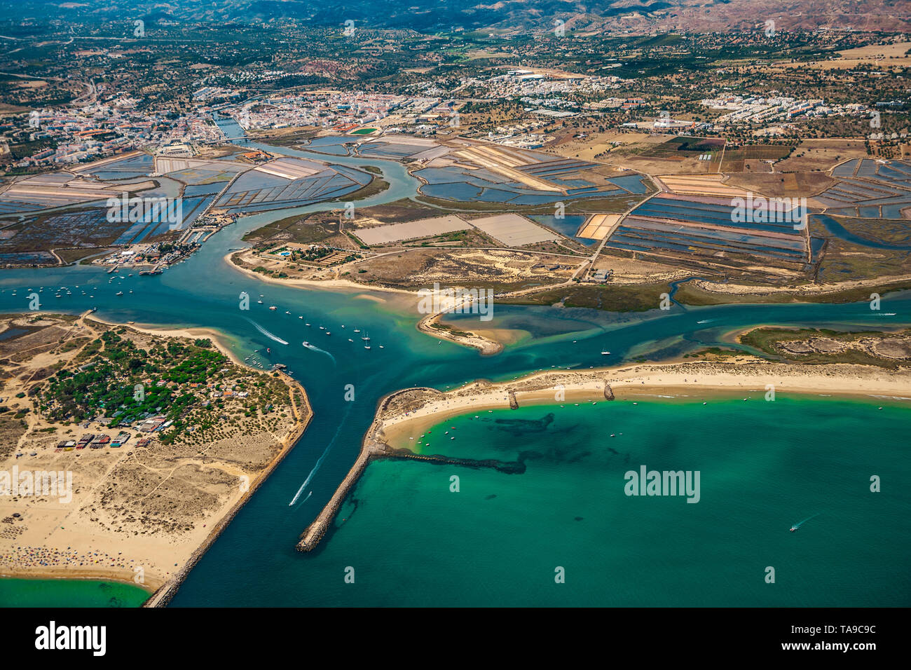 In the foreground Ilha de Cabanas island. In the background Salt Pans of Tavira. On the left Ria