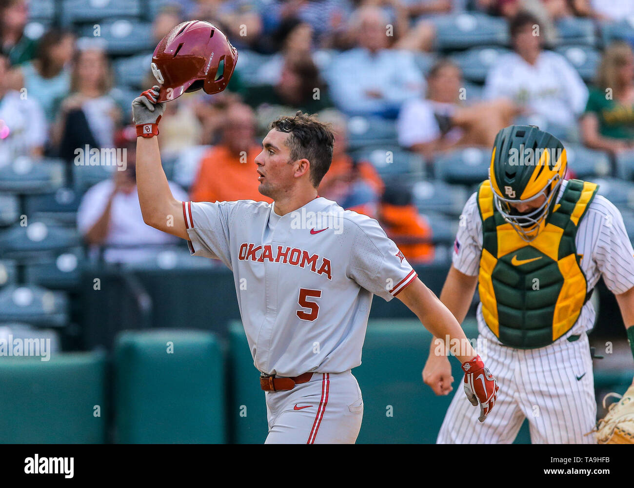 Oklahoma City, OK, USA. 22nd May, 2019. University of Oklahoma infielder Conor McKenna (5) after hitting solo home run during a 2019 Phillips 66 Big 12 Baseball Championship first round game between the Oklahoma Sooners and the Baylor Bears at Chickasaw Bricktown Ballpark in Oklahoma City, OK. Gray Siegel/CSM/Alamy Live News Stock Photo