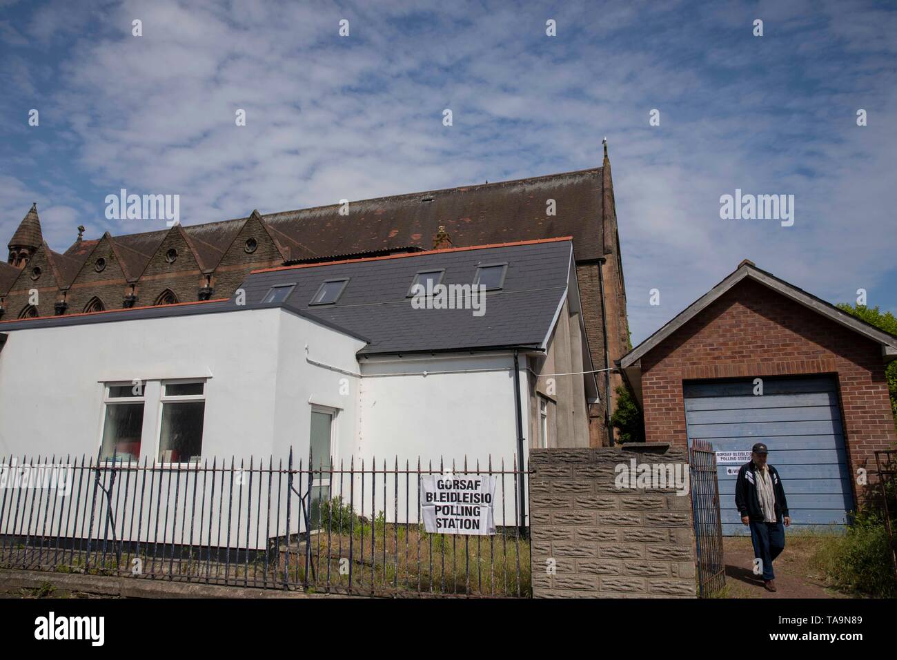 Cardiff, Wales, UK, May 23rd 2019. A man exits a polling station at St Paul's Community Hall in Grangetown, Cardiff, on the morning of the European Elections. Credit: Mark Hawkins/Alamy Live News Stock Photo