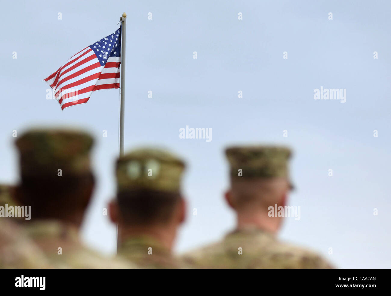 American Soldiers and US Flag. US troops Stock Photo