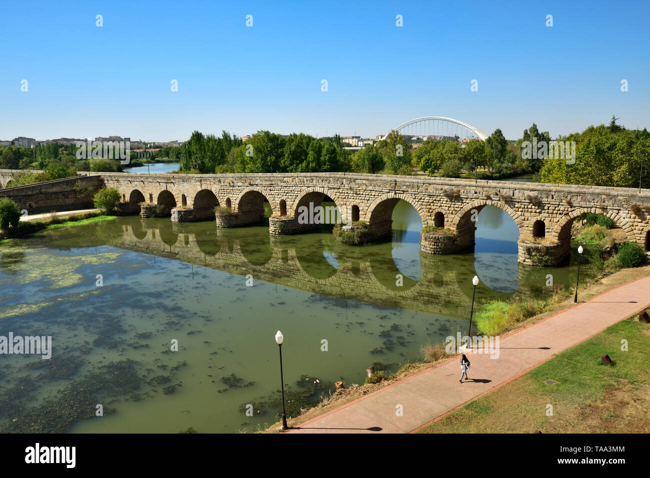 The Puente Romano (Roman Bridge) over the Guadiana river, dating back to the 1st century BC. It is the world's longest bridge from ancient times. A Un Stock Photo