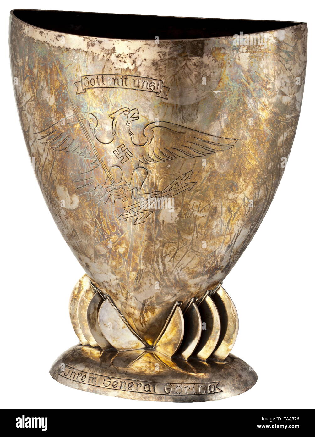 Hermann Göring - Emmy Sonnemann, a wedding present of the Prussian police force 1935 Large, hand-hammered silver vase with engraved emblem of the Prussian police with banner (tr.) "God with us!" and the dedication inscription (tr.) "To our General Göring - 10 April 1935 the Prussian Police". Master mark "HJ Wilm Berlin", master monogram "FR", on the base the company mark "H.J. Wilm Berlin", (tr.) "hand beaten" and "925", height 38 cm, width 33 cm, weight 3600 g. Provenance: Keith Wilson Collection, Kansas City. Göring's wedding with the famous actress Emmy Sonnemann was one, Editorial-Use-Only Stock Photo