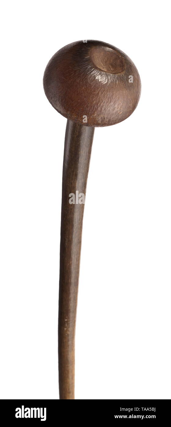 A rhinoceros knobkerrie of the Zulu/Nguni One-piece club carved from rhinoceros horn. Oval striking head, on the upper side a small conical indentation. Slender shaft, the lower end with a perforation for a thong. Length 65 cm, weight 617 g. A rare impact weapon of the South African Bantu people. historic, historical, Africa, African, weapon, arms, weapons, arms, fighting device, Additional-Rights-Clearance-Info-Not-Available Stock Photo