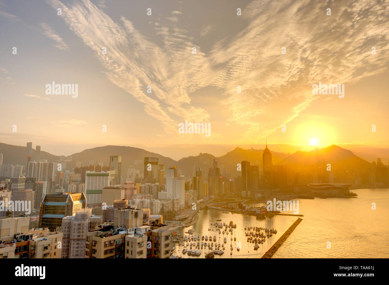 Hong Kong harbour at sunset Stock Photo - Alamy