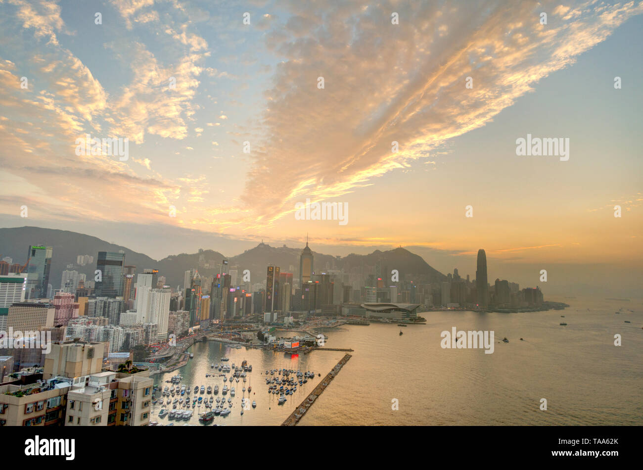 Hong Kong harbour at sunset Stock Photo - Alamy