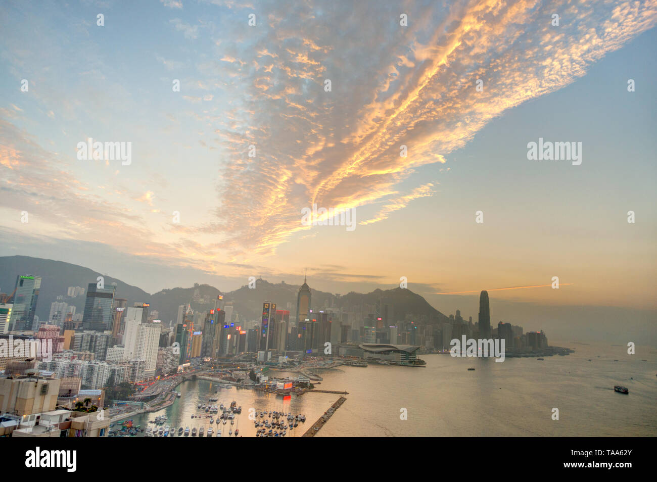 Hong Kong harbour at sunset Stock Photo - Alamy