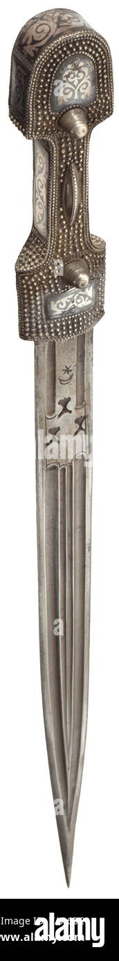 A Caucasian silver-mounted kinjal, circa 1900 Double-edged blade, both sides with multiple grooves and with smith's marks at the base. Grip and scabbard in silver with ornamental niello work, the entire obverse surface with a beaded band decor. Length 57.5 cm. historic, historical, Ottoman, Orient, Oriental, Asia, Asian, 20th century, Additional-Rights-Clearance-Info-Not-Available Stock Photo