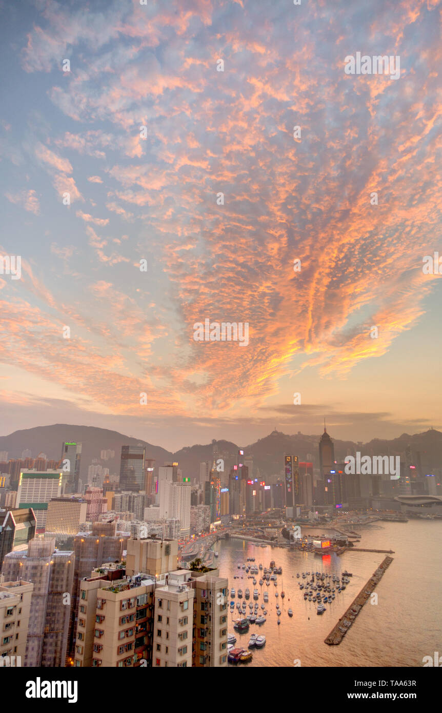 Hong Kong harbour at sunset Stock Photo - Alamy