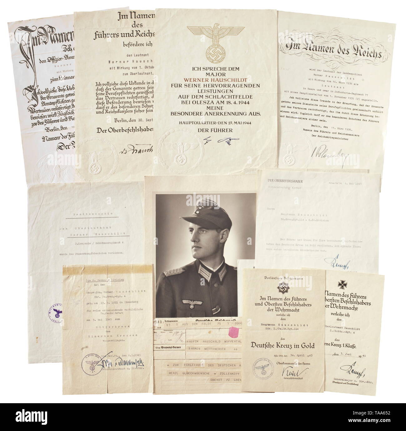 Documents and photos of Oberstleutnant Werner Hauschildt, commander of Panzer Grenadier Regiment '4' in 6th Panzer Division Documents: Commendation Certificate for Outstanding Services on the Battlefield of 'Olesha' dated 27 May 1944 with original signature of Adolf Hitler, dimensions 21 x 29.5 cm. Recommendation for the Knight's Cross of the Iron Cross dated 6 May 1945 with original signature of General Freiherr von Waldenfeld. Preliminary possession document for the German Cross in Gold dated 30 April 1943, along with various best wishes letters and telegrams. Award docum, Editorial-Use-Only Stock Photo