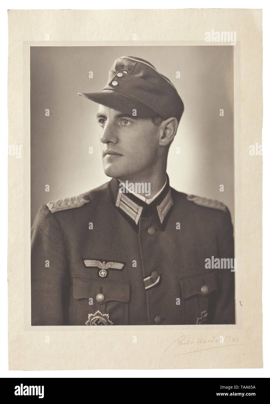 Documents and photos of Oberstleutnant Werner Hauschildt, commander of Panzer Grenadier Regiment "4" in 6th Panzer Division Documents: Commendation Certificate for Outstanding Services on the Battlefield of "Olesha" dated 27 May 1944 with original signature of Adolf Hitler, dimensions 21 x 29.5 cm. Recommendation for the Knight's Cross of the Iron Cross dated 6 May 1945 with original signature of General Freiherr von Waldenfeld. Preliminary possession document for the German Cross in Gold dated 30 April 1943, along with various best wishes letters and telegrams. Award docum, Editorial-Use-Only Stock Photo
