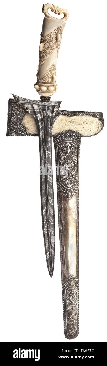 A Sumatran silver fitted kris, 20th century Straight, heavily ridged blade on both sides with a carved base and superb black-white pamor. Stone-studded mendhak with lavishly carved, tapering bone grip. Warangka and scabbard of bone with finely chased floral silver mounting on both sides. Length 62 cm. historic, historical, Indonesian archipelago, Indonesia, Far East, Asia, Asian, ethnology, ethnicity, ethnic, tribal, object, objects, stills, clipping, clippings, cut out, cut-out, cut-outs, Additional-Rights-Clearance-Info-Not-Available Stock Photo