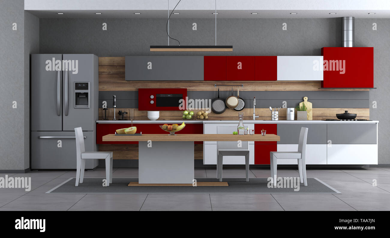 Red ,white and gray modern kitchen with minimalist dining table and chairs - 3d rendering Stock Photo