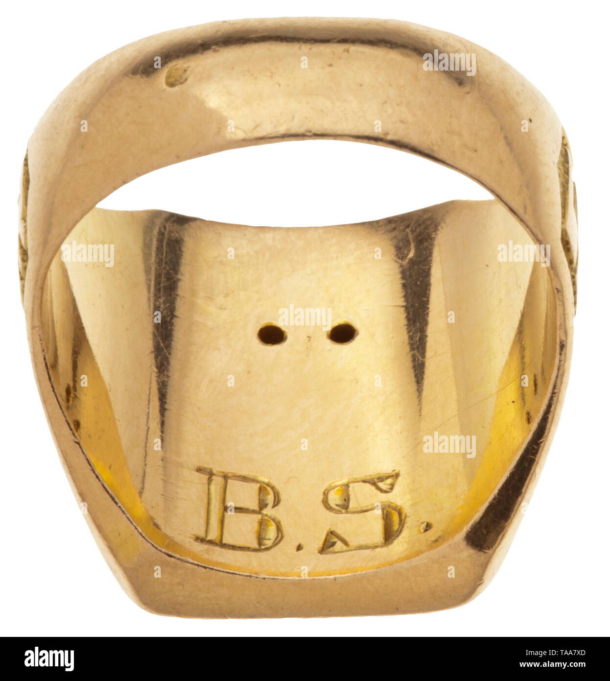 A Condor Legion honour ring Handwork in .750 yellow gold, relief-work, punched, at top a death's head with diamond eyes and crossed bones, below 'AS 88' for Staffel 88 (sea reconnaissance), laterally the lettering 'Legion' and 'Condor'. The inner surface of the ring band engraved 'B.S.'. Light signs of usage and age. Weight 19.4 g. Awarded by Hermann Göring to the eleven Staffel 88 pilots for exceptional merit. historic, historical, Wehrmacht, armed forces, unit, units, troop, troops, NS, National Socialism, Nazism, Third Reich, German Reich, military, militaria, National S, Editorial-Use-Only Stock Photo