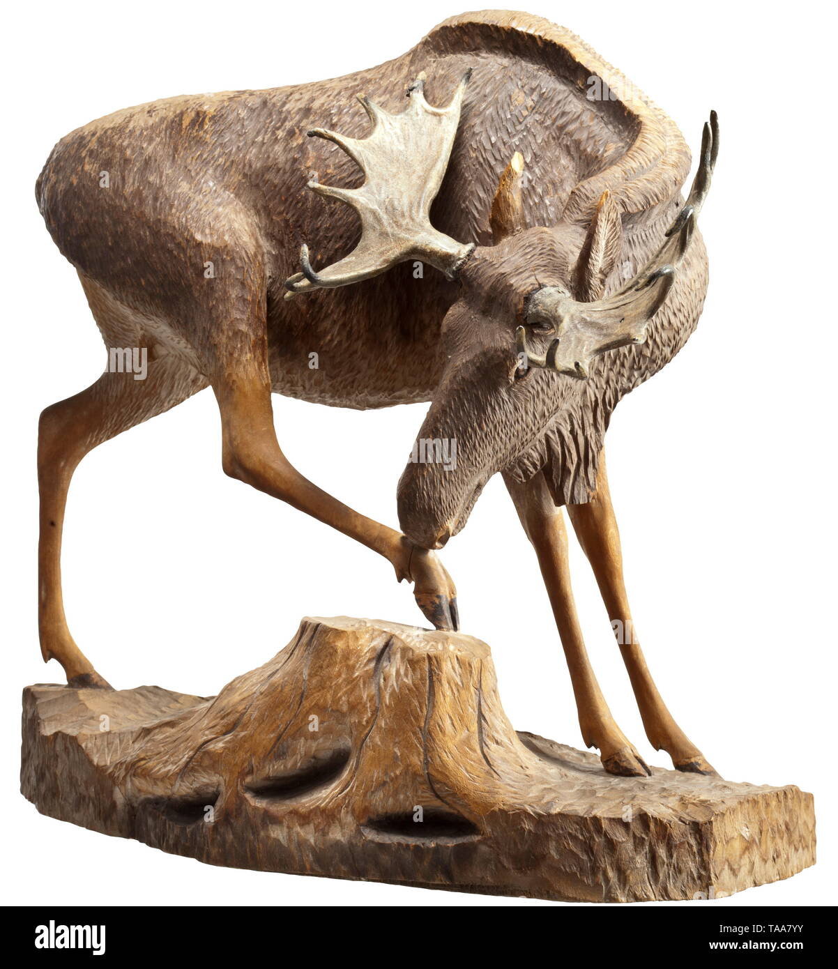 An officer's gift from Eduard Dietl (1890 - 1944) to his 1st general staff officer Oberst Sittmann Carved three-dimensional depiction of a bull elk in the finest artistic quality, the antlers of lacquered lead, the lower side with inscription 'Eismeerfront/März 1943 seinem 1. Generalstabsoffizier der kommandierende General' (tr. 'Polar Sea front/March 1943 to his 1st General Staff Officer from the Commanding General'). Minimal blemishes. Height 33 cm. historic, historical, mountain infantry, troops, army, armed forces, military, militaria, object, Additional-Rights-Clearance-Info-Not-Available Stock Photo