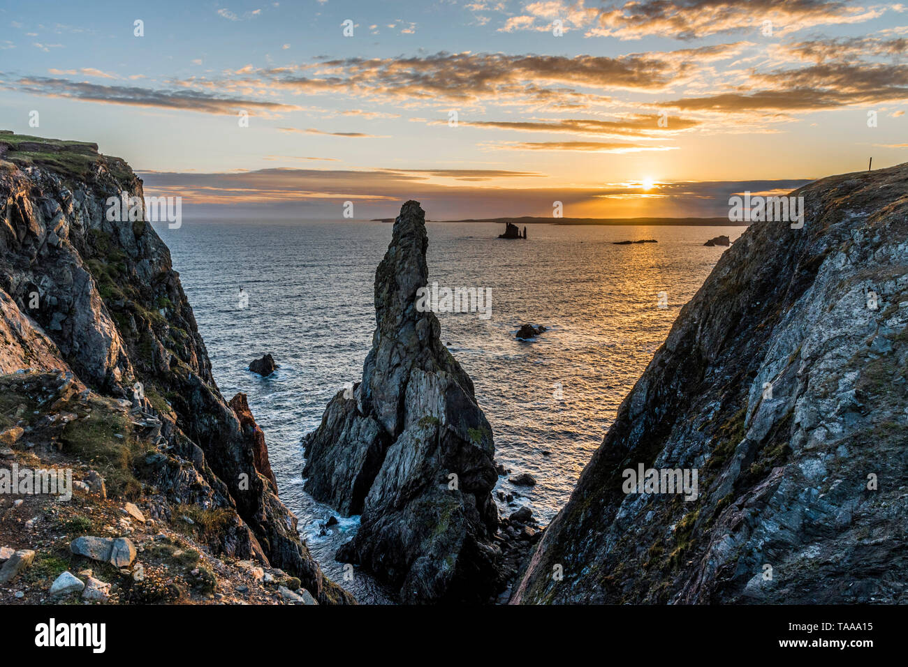 Cliffs and rocky islet, Echeness, Shetland Stock Photo