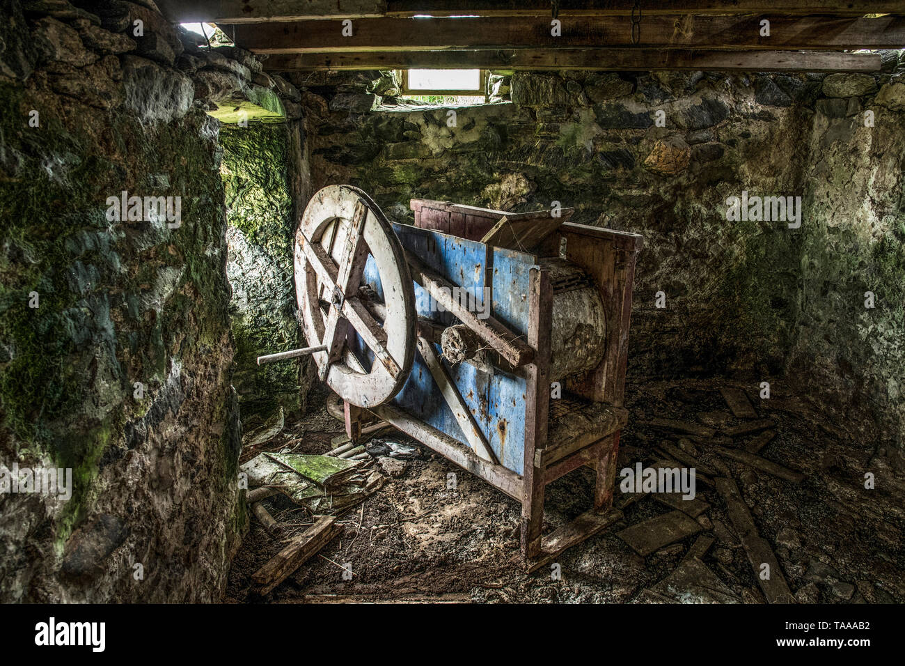 Winnowing machine in abandoned cottage, Yell, Shetland Stock Photo
