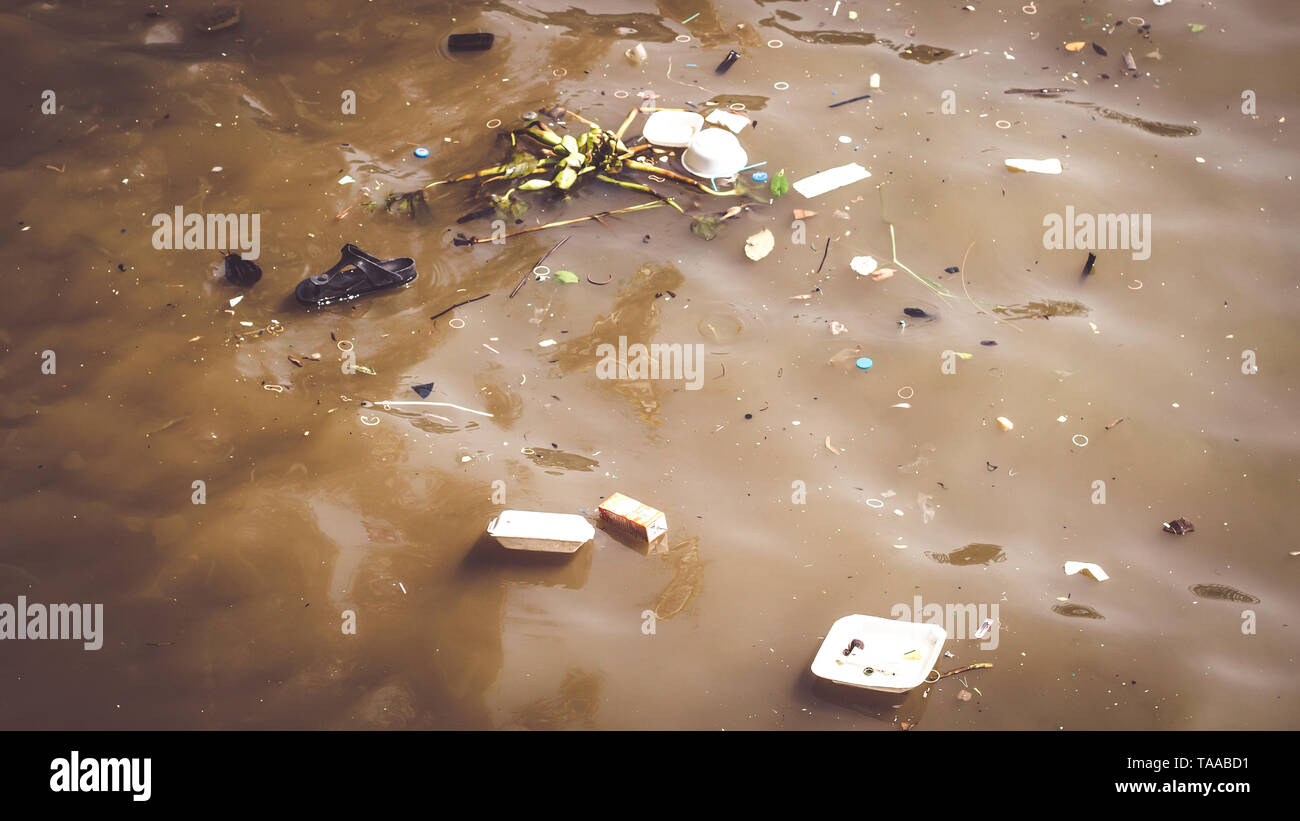 Water pollution caused by dumping plastic waste. Resulting in a bad