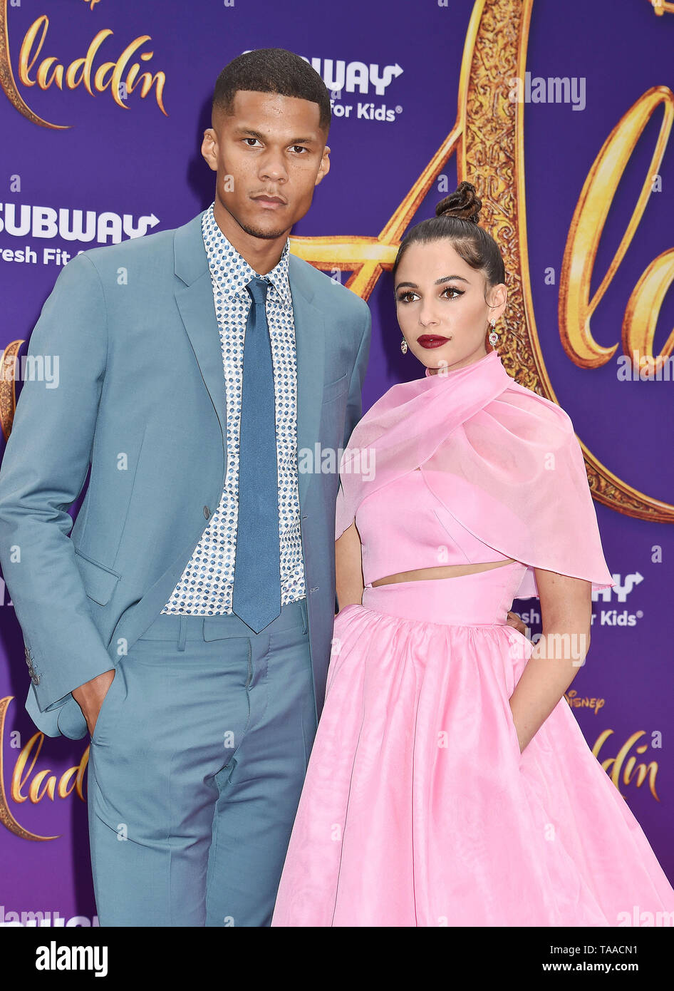 LOS ANGELES, CA - MAY 21: Jordan Spence and Naomi Scott attend the premiere of Disney's 'Aladdin' at El Capitan Theatre on May 21, 2019 in Los Angeles, California. Stock Photo