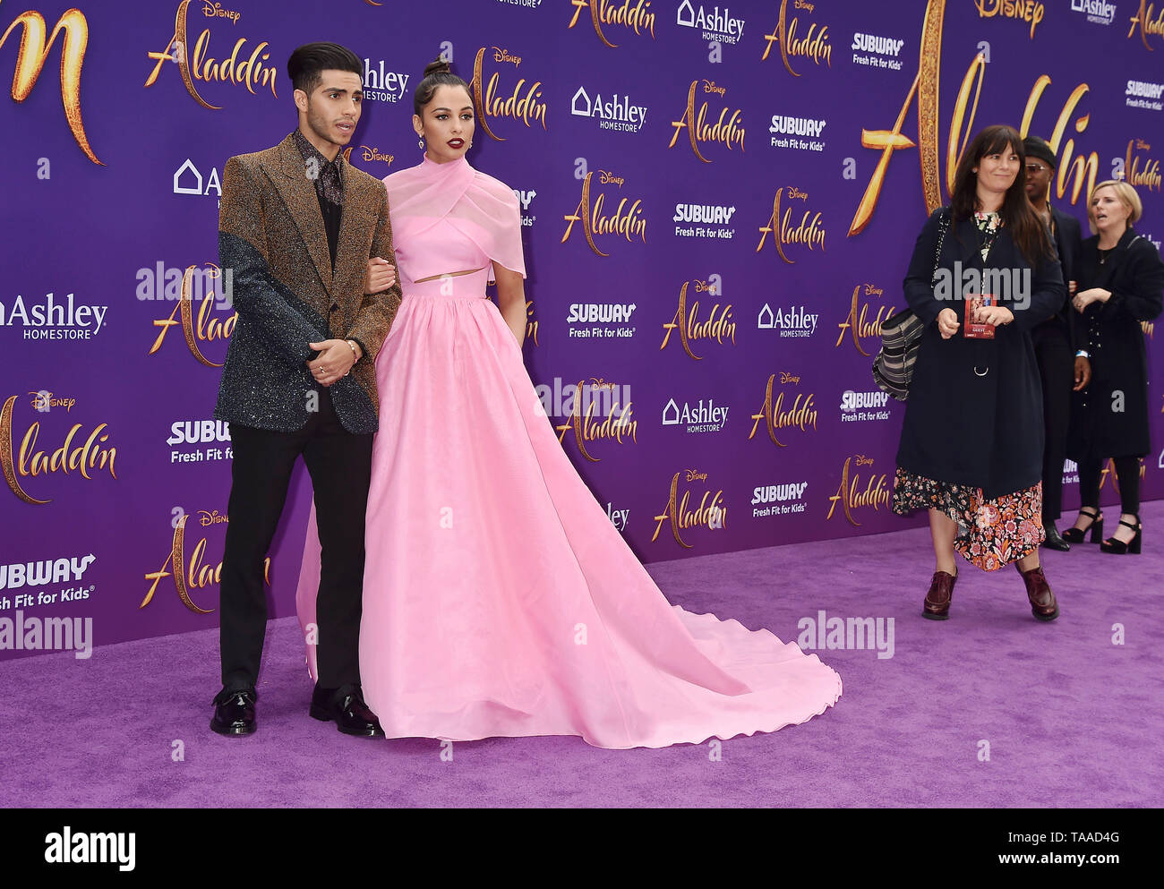 LOS ANGELES, CA - MAY 21: Mena Massoud and Naomi Scott attend the premiere of Disney's 'Aladdin' at El Capitan Theatre on May 21, 2019 in Los Angeles, California. Stock Photo