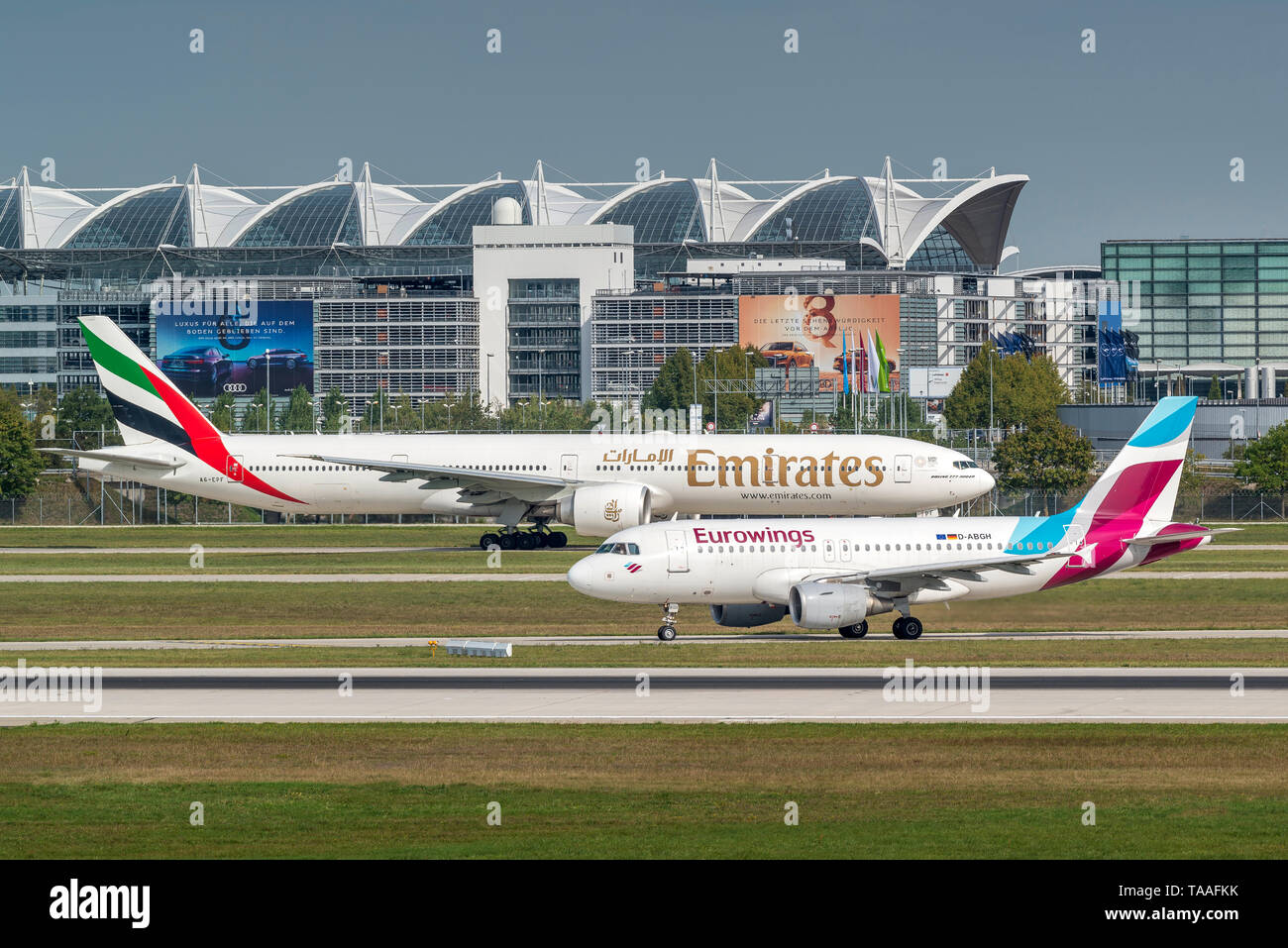 Munich, Germany - 11. September 2018 : Emirates Boeing 777-31H (ER) with the registration A6-EPF, is taxiing to the start on the southern runway at th Stock Photo