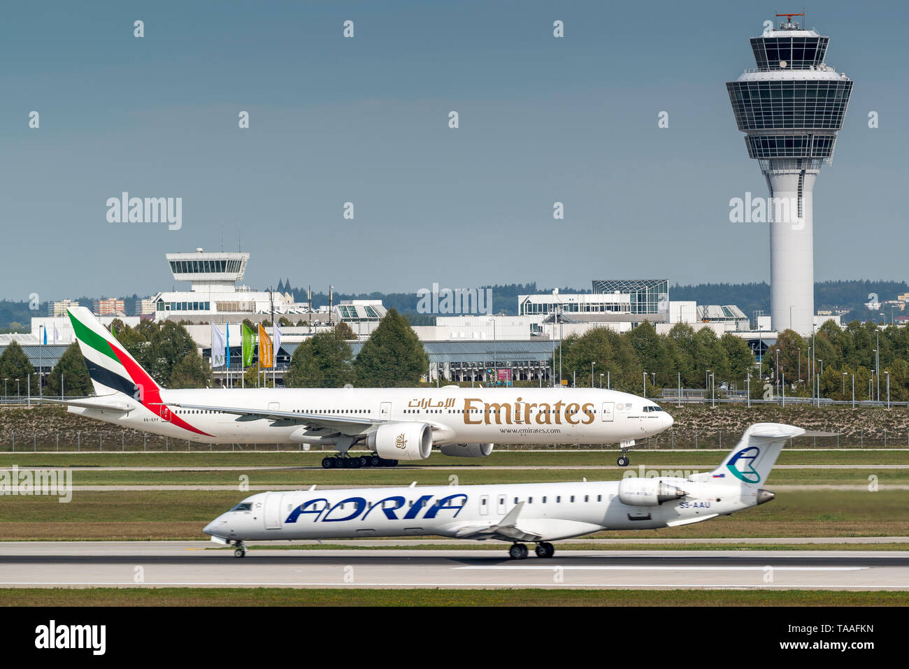 Munich, Germany - 11. September 2018 : Emirates Boeing 777-31H (ER) with the registration A6-EPF, is taxiing to the start on the southern runway at th Stock Photo