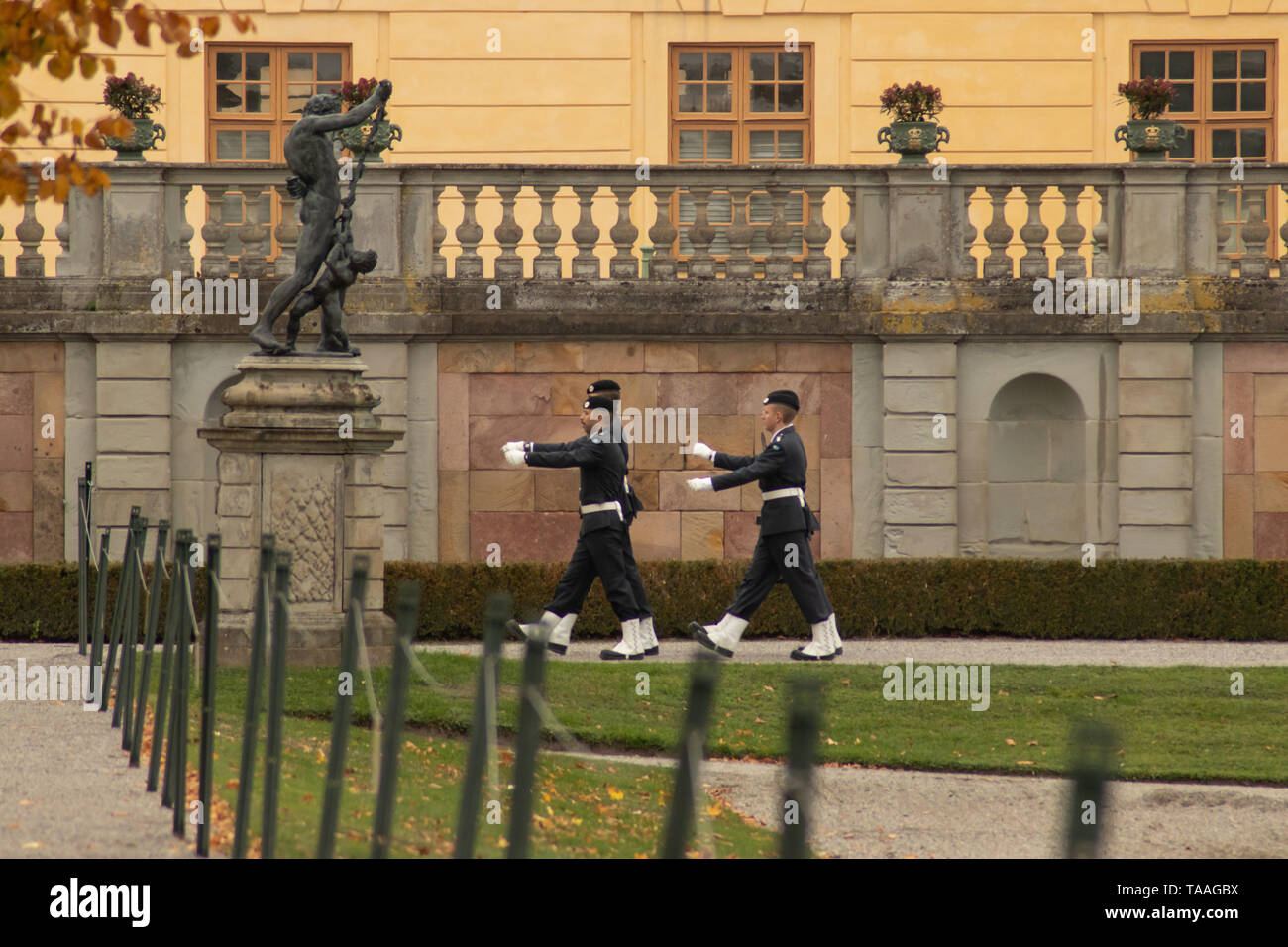 Royal guards patrolling around Drottningholm Castle Stock Photo