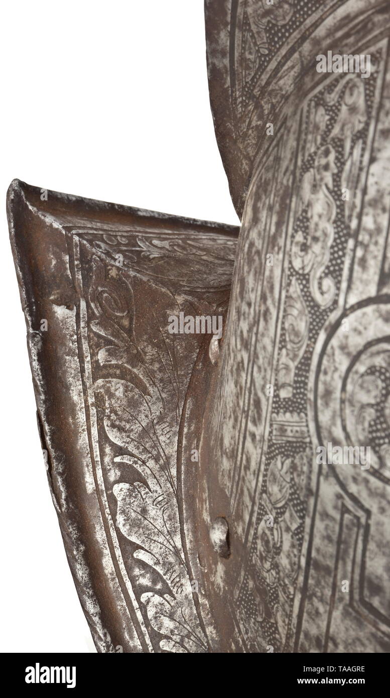 A German Morion Circa 1600 With Later Etching One Piece Skull With High Roped Comb Continuous Iron Lining Rivets Pointed Brim With Turned And Roped Edge Profusely Embellished With Exquisite Etchings From The