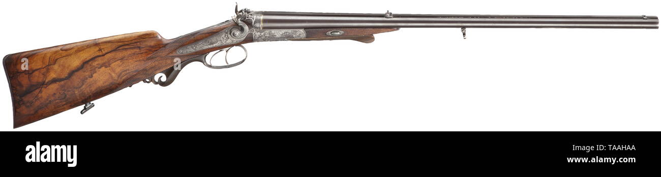 A Miller & Val. Greiss hammer double rifle, Munich, from the property of His Royal Highness Prinzregent Luitpold Almost bright bores, length 60 cm. Cal. 10.5 x 73 Miller & Greiss Magnum. Fixed sight. Additional foldable aperture sight on stock wrist. Barrels in plum-coloured bluing. Breech with barrel hook- and dolls head locking. Rear-positioned locks. Action case, lock plates and trigger guard engraved. Portrayed on the left mountain goats and deer rut. On the right dog on boar and dog barking at stag. Inscribed around hammer axis 'MILLER & VAL, Additional-Rights-Clearance-Info-Not-Available Stock Photo