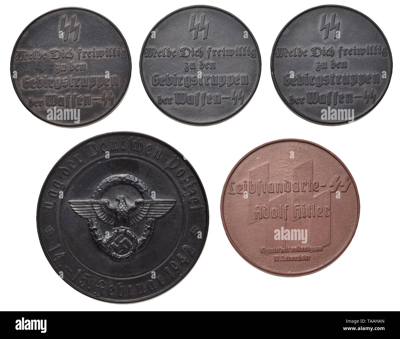 Mountain troops of the Waffen-SS - five Bakelite plaques Three plaques with inscription (tr.) 'SS Sign up voluntarily for the mountain troops of the Waffen-SS', views of Murnau, Inzell and Kiefersfelden on the reverse, diameter of each circa 40 mm. Furthermore, a brown plaque inscribed (tr.) 'SS Leibstandarte-SS Adolf Hitler enlistment at the age of 17', the reverse with a portrait of Hitler, diameter 45 mm. Plaque (tr.) 'Day of the German police force - 14-15 February 1942', Gau Kärnten Villach on the reverse, diameter 55 mm. Slight traces of age. historic, historical, 20t, Editorial-Use-Only Stock Photo