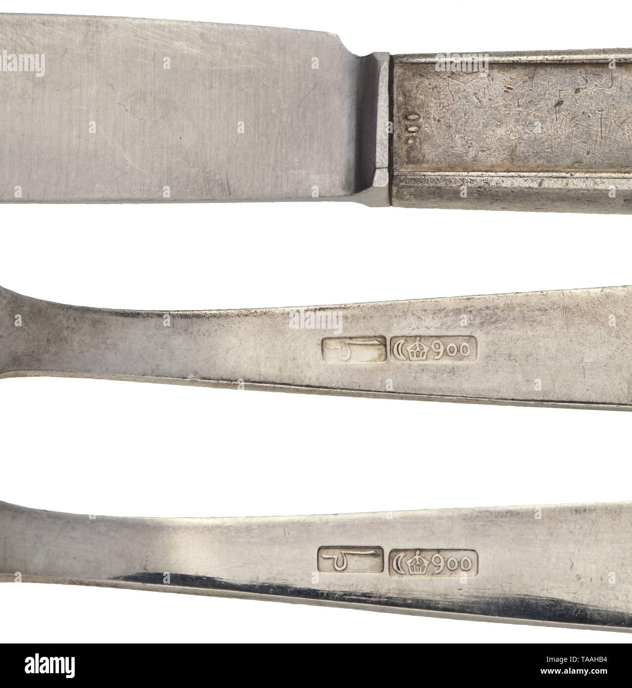 Joachim von Ribbentropp (1893 - 1946), Reich Minister for Foreign Affairs - a three-piece cutlery set from the ministry Pieces of silver cutlery, stamped with crown, crescent and '900'. Applied symbol of the Foreign Office, national eagle with swastika above globe. Knife with iron blade, length 21.3 cm, spoon and fork 18.5 cm each. Slight traces of age and usage. Rare. historic, historical, 20th century, 1930s, NS, National Socialism, Nazism, Third Reich, German Reich, Germany, German, National Socialist, Nazi, Nazi period, fascism, Editorial-Use-Only Stock Photo
